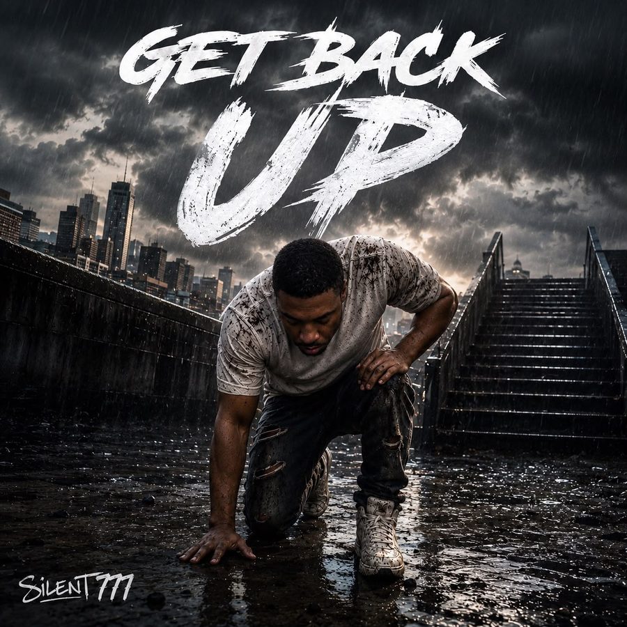 Cover art for Get Back Up: Silent 777 on one knee in the rain, with a stairway and city skyline behind him.