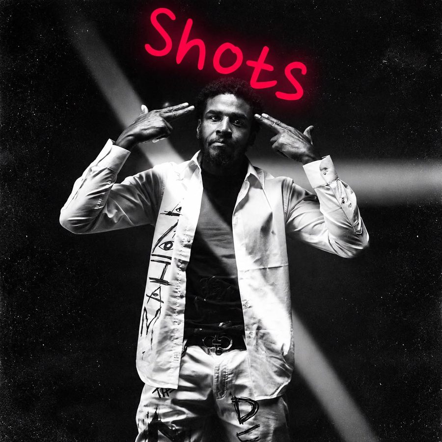 Cover art for Shots: black and white photo of Silent 777 with two fingers to each temple, with the title glowing red above his head.